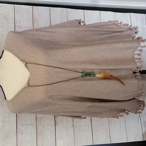 Cotton sweater pullover with western flair.